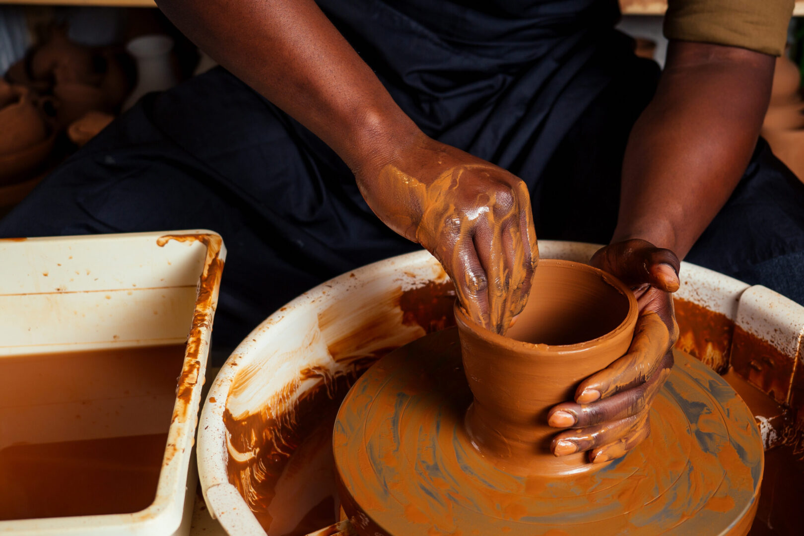 potter with clay